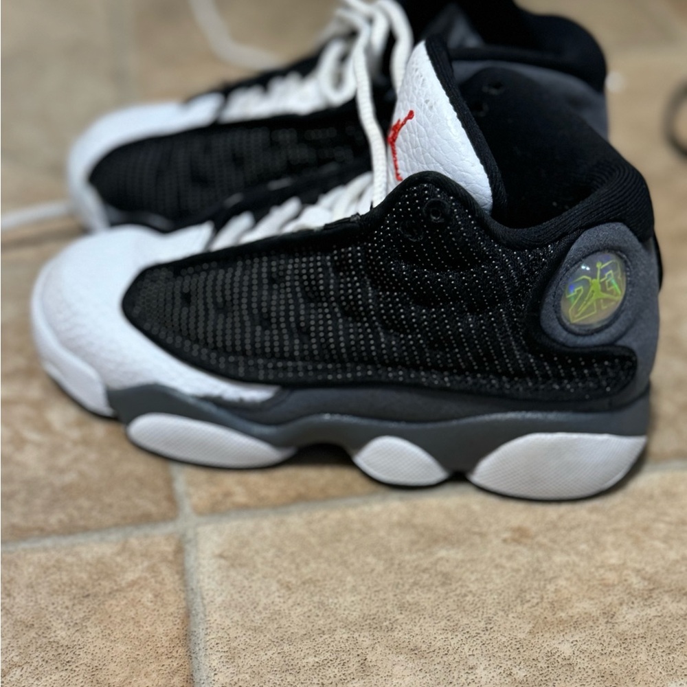 Kids size 12c Air Jordan retro 13s black flint